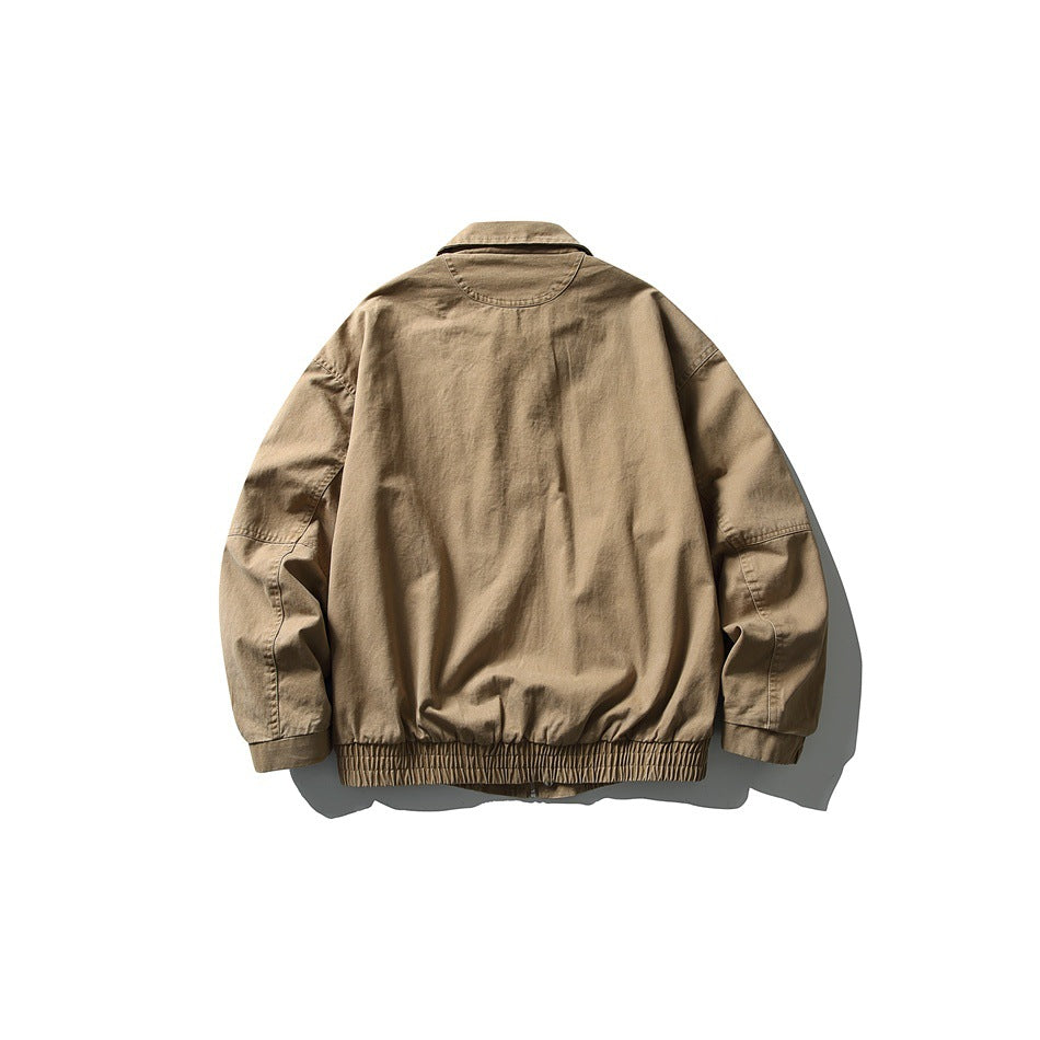 Khaki jacket back view flat lay showing collar stitching, raglan sleeves and elastic gathered hem