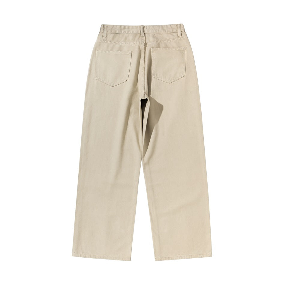 Back view of light beige loose straight-leg pants with belt loops and two patch pockets.