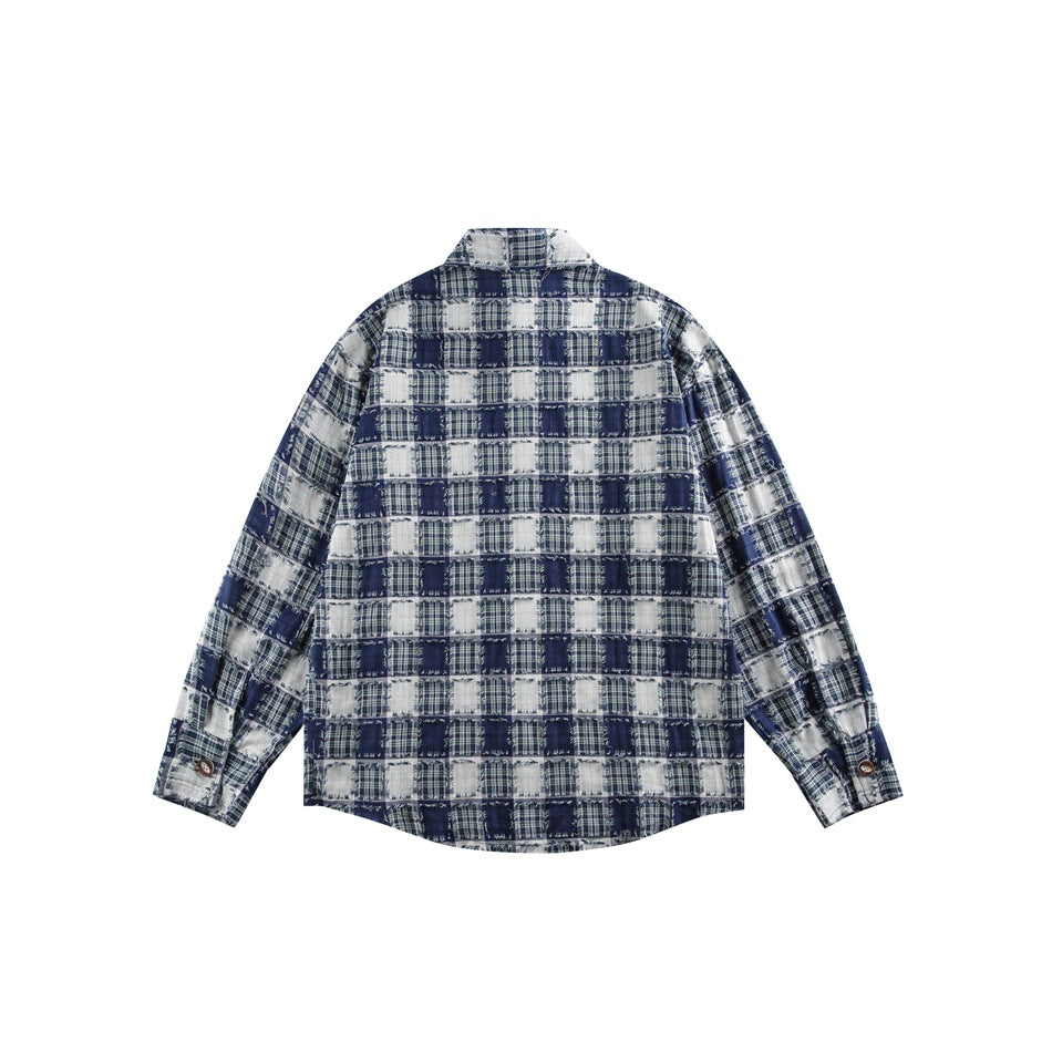 Back view of a navy and white patchwork plaid button-up shirt with long sleeves.