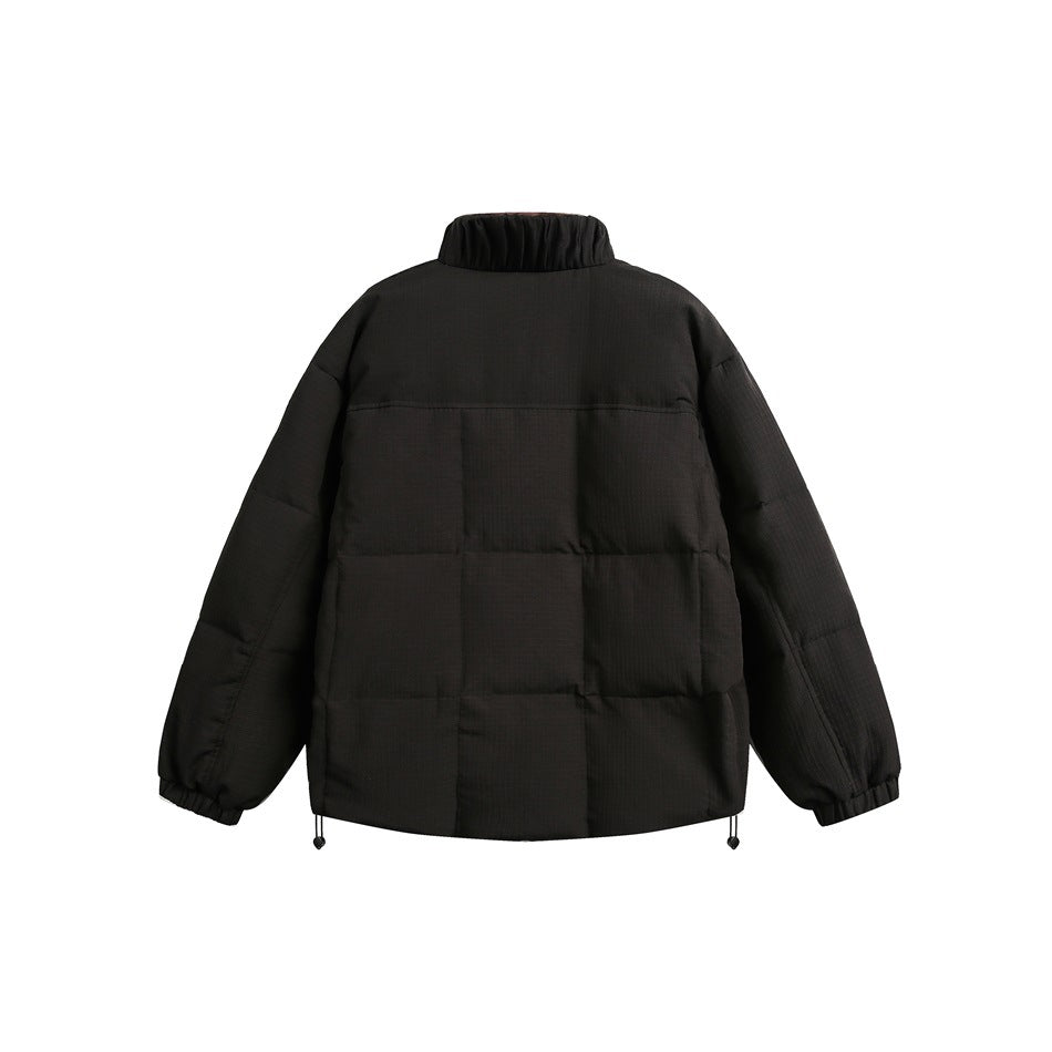 Back view of a black quilted puffer jacket with a stand collar and elastic cuffs.