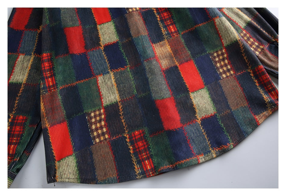 Close view of the garment's lower panel and curved hem in a multicolor patchwork pattern.