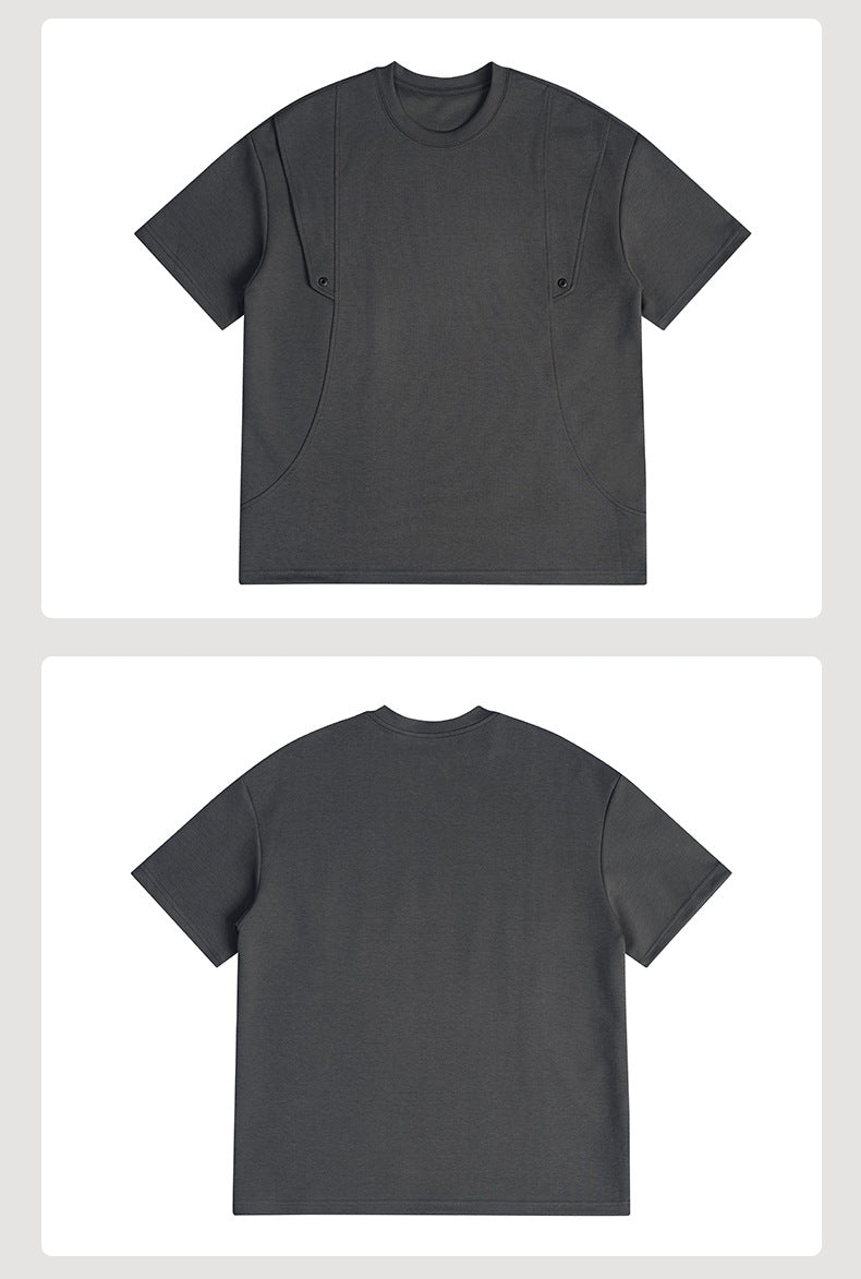 Catalog-style layout showing the front and back of a charcoal gray short-sleeve T-shirt with curved seams and snaps.