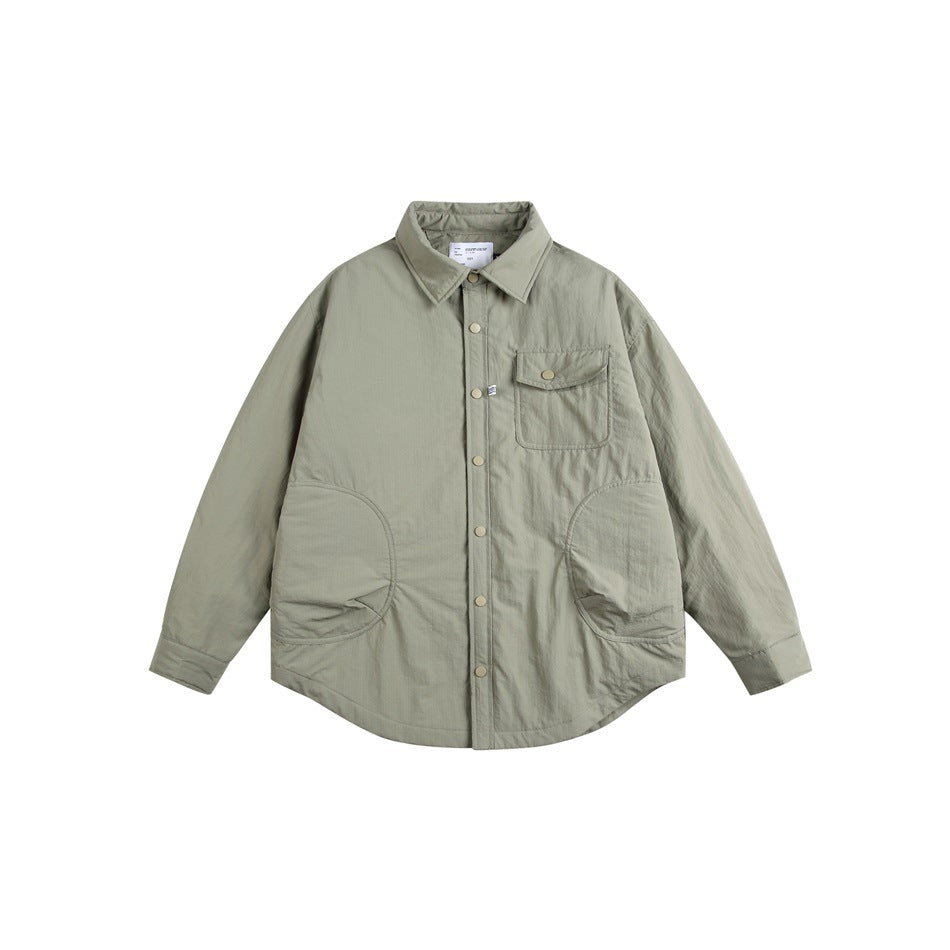 Green shirt-style jacket flat lay, front view, with snap buttons, chest flap pocket and curved side pockets