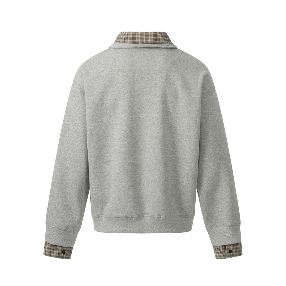 Back view of a light gray collared pullover with checked fabric at the collar and sleeve cuffs.