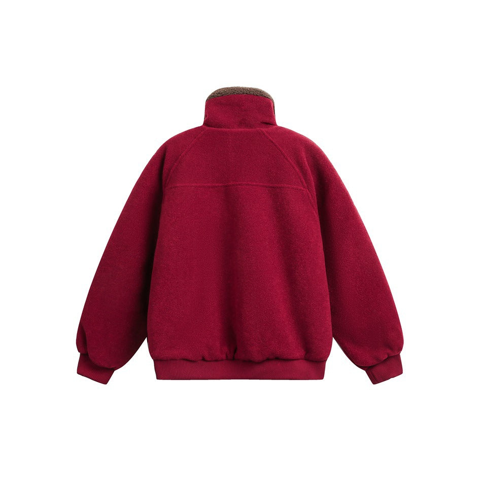 Back view of a deep red jacket with a tan fleece collar, raglan sleeves and ribbed cuffs and hem.