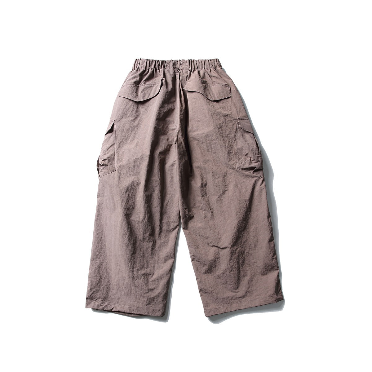 Back view of mauve-taupe Haze Purple wide-leg cargo pants with flap back pockets and side cargo pockets