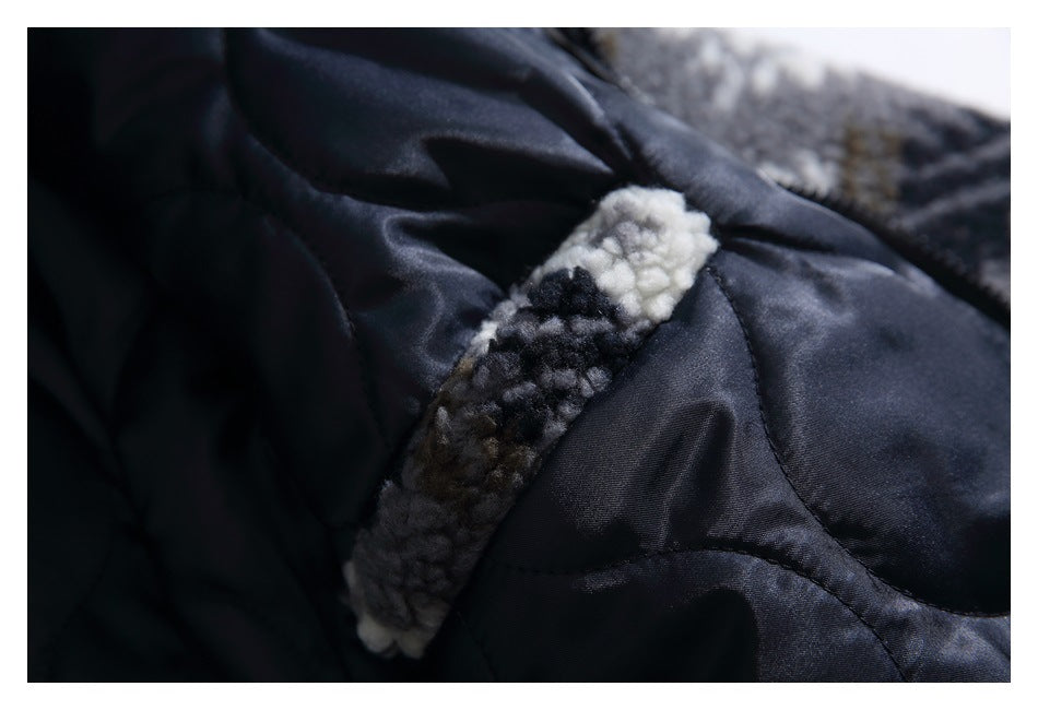 Close-up of a patterned fleece tab against dark quilted lining.
