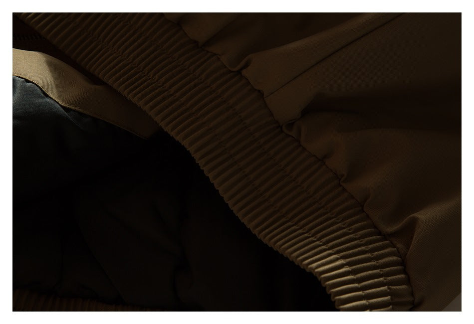 Close-up of the garment's gathered elastic waistband and dark interior.