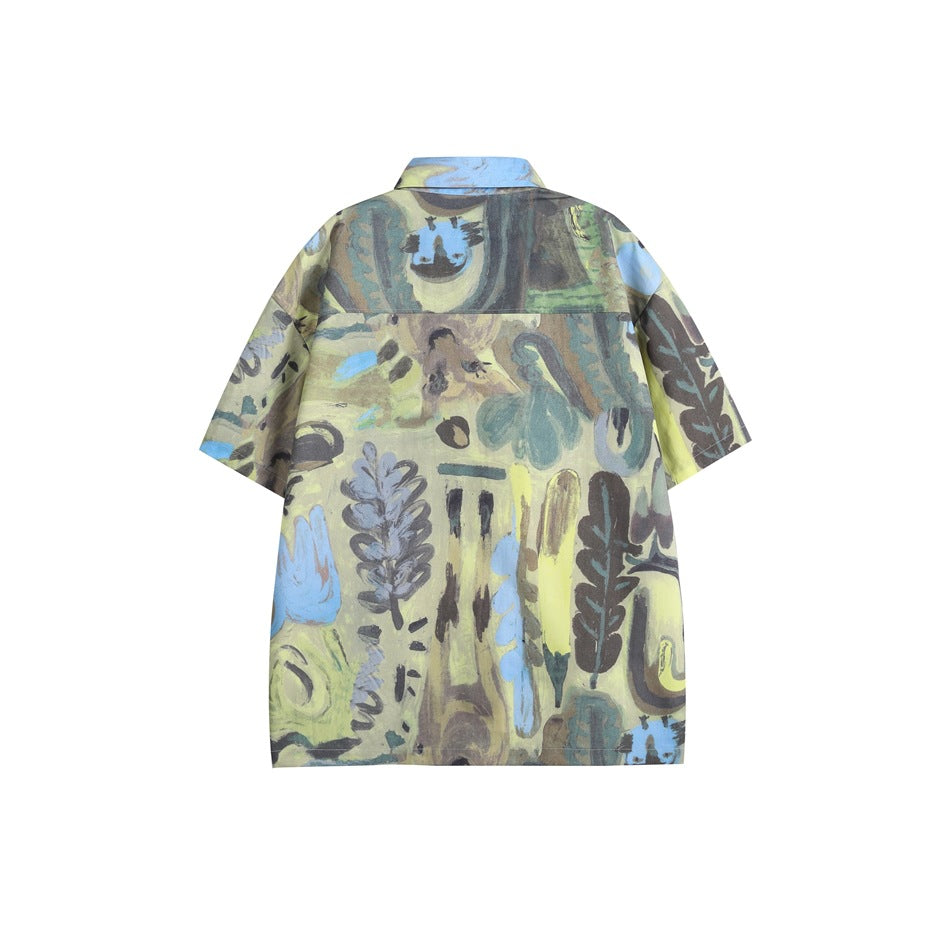 Back view of a yellow-green, blue and gray short-sleeve button-up shirt with an allover abstract print.