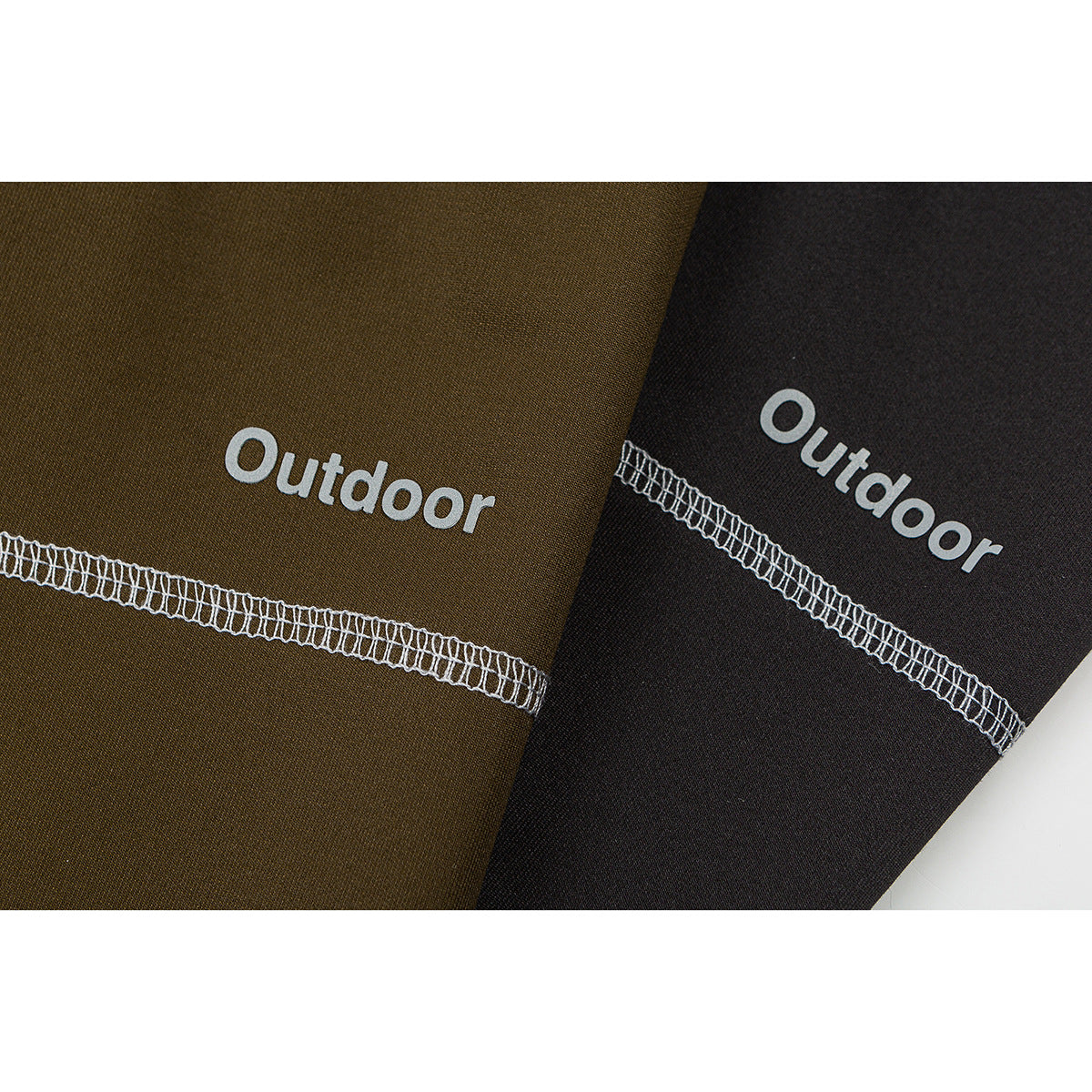 Close-up of olive-brown and black shirt panels with white overlock stitching and “Outdoor” lettering.