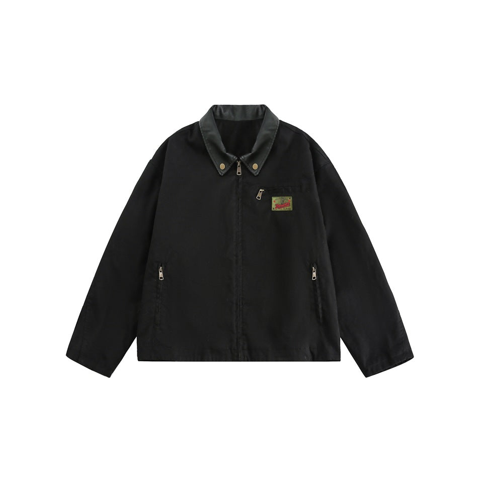 Black zip-front jacket with a leather-look collar, snap buttons, chest zip pocket, patch and zippered side pockets