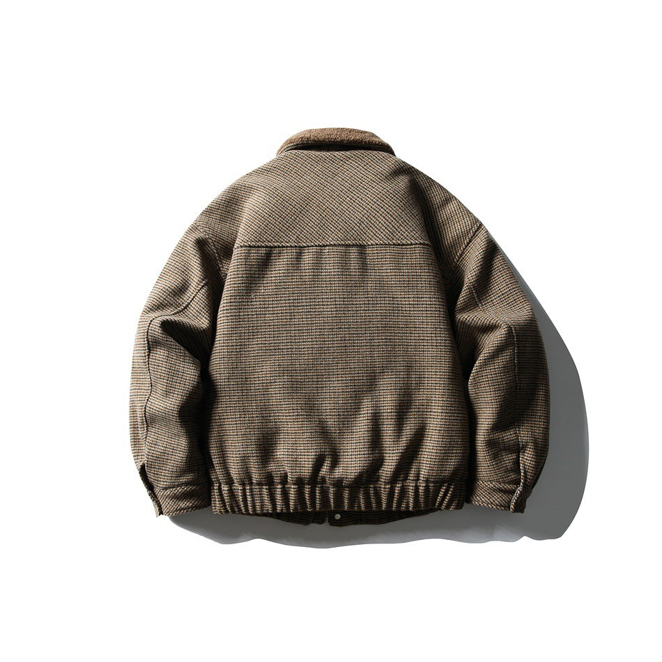 Back view of a brown-and-tan checked jacket with a broad yoke, gathered hem, and long sleeves.