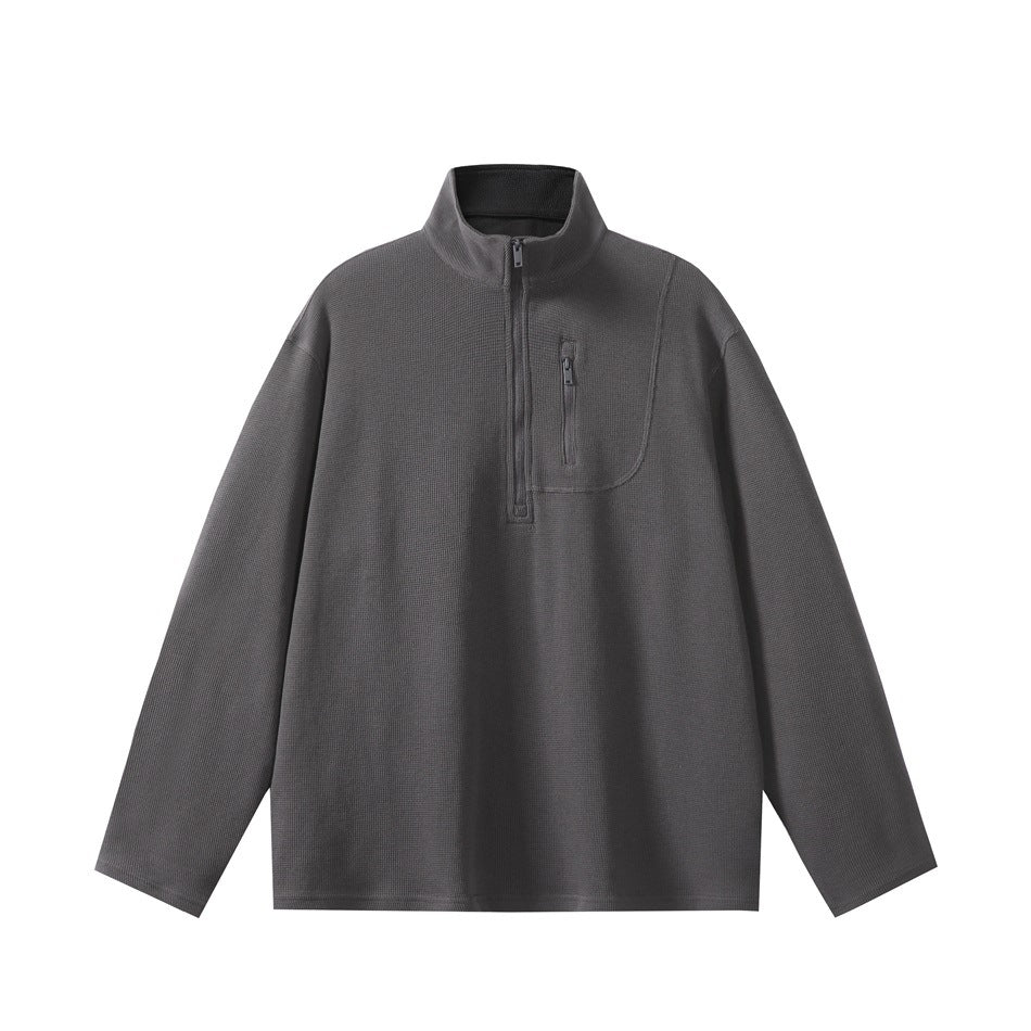 Dark gray half-zip waffle-knit pullover with stand collar and zippered chest pocket, flat front view