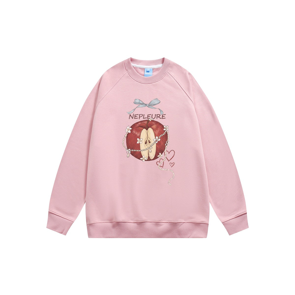 Pink raglan crew neck sweatshirt flat lay with apple, pearl chain, bow and heart graphic on the front