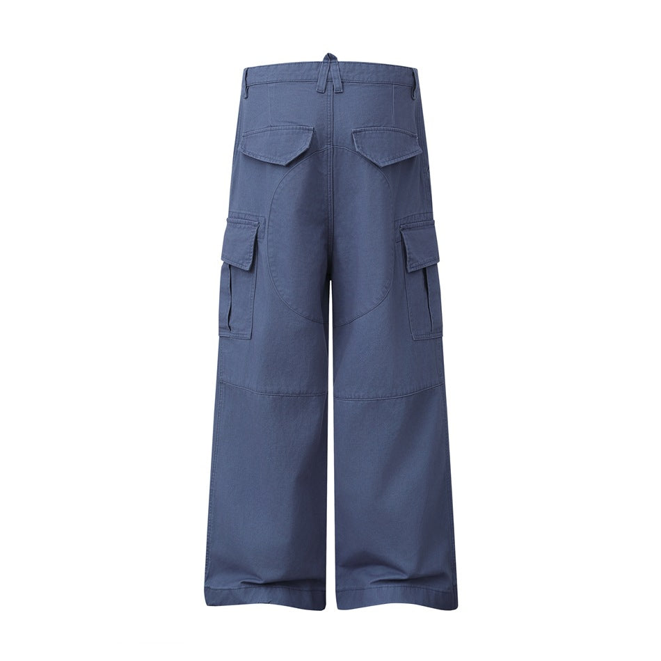 Back view of slate-blue wide-leg cargo pants with flap pockets, cargo pockets, and curved seat panels.