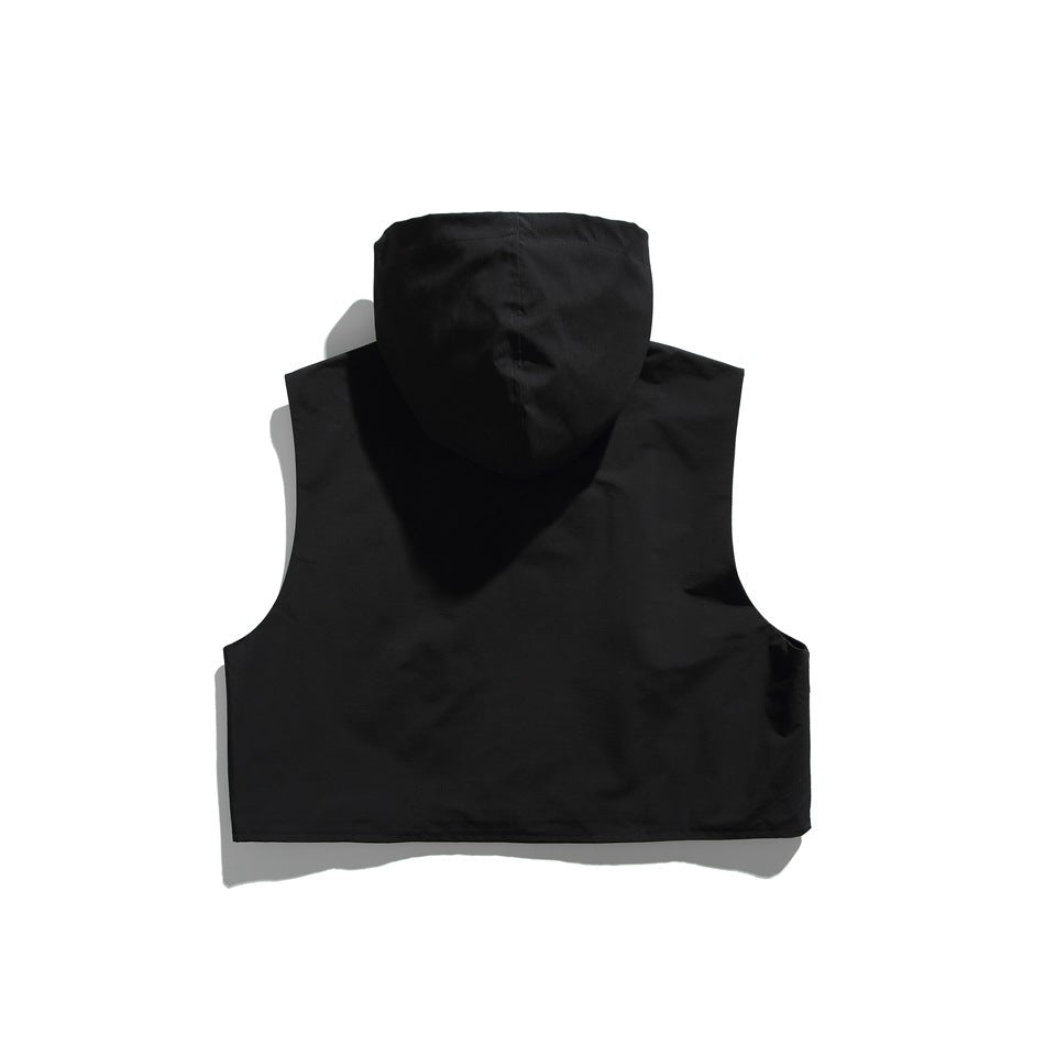 Back view of a black sleeveless hooded vest with a plain back panel and hood lying flat