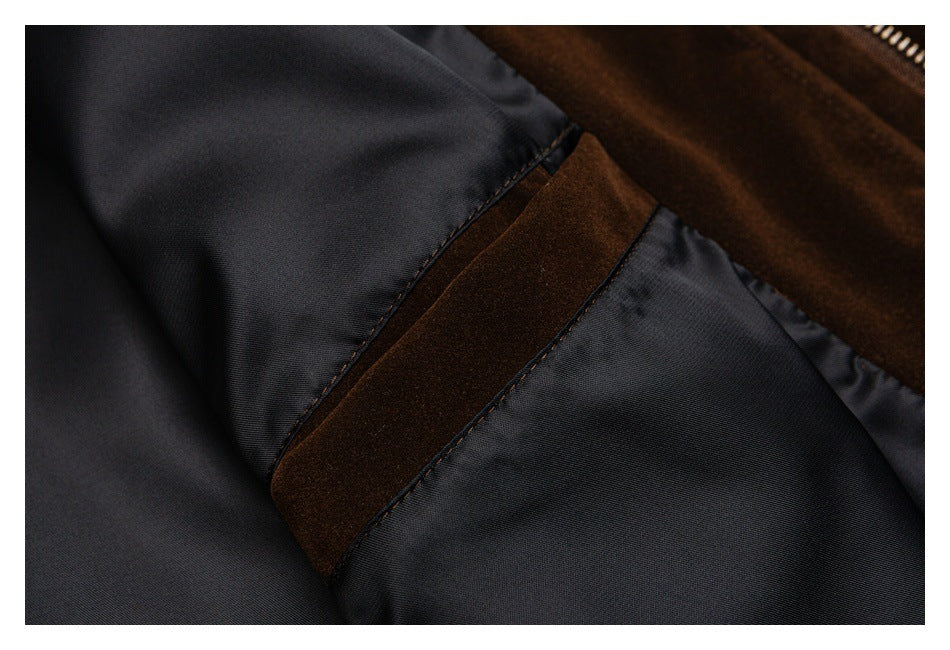 Close-up of dark lining and a brown fabric seam inside the garment.