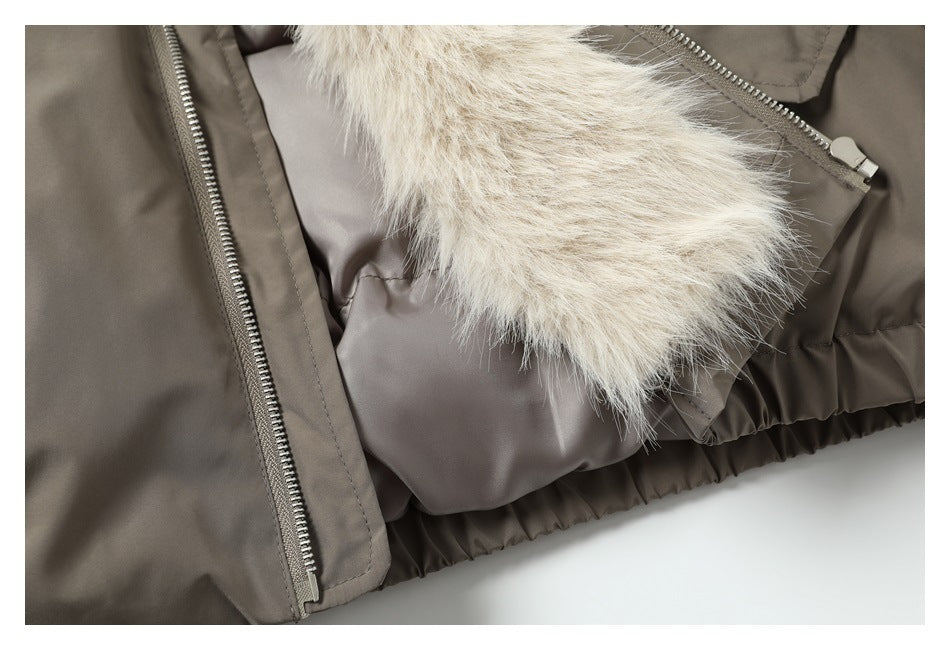 Open taupe jacket close-up showing a pale faux-fur trim, lining, and zipper.