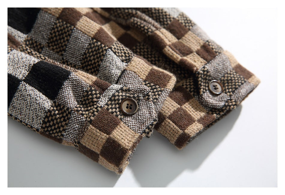 Close-up of two buttoned cuffs on a brown, tan, gray, and black check shirt.
