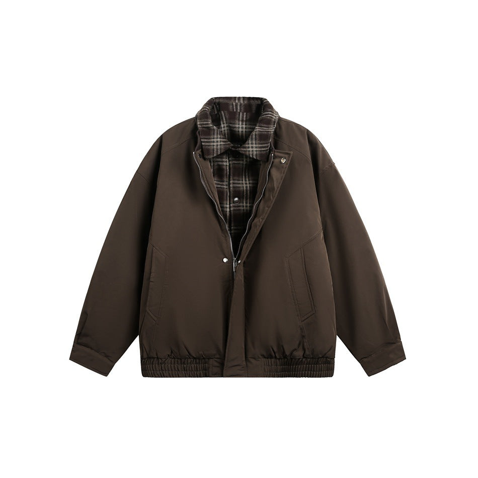 Front view of a dark brown jacket with a zip and snap front, plaid inner collar, and angled pockets.