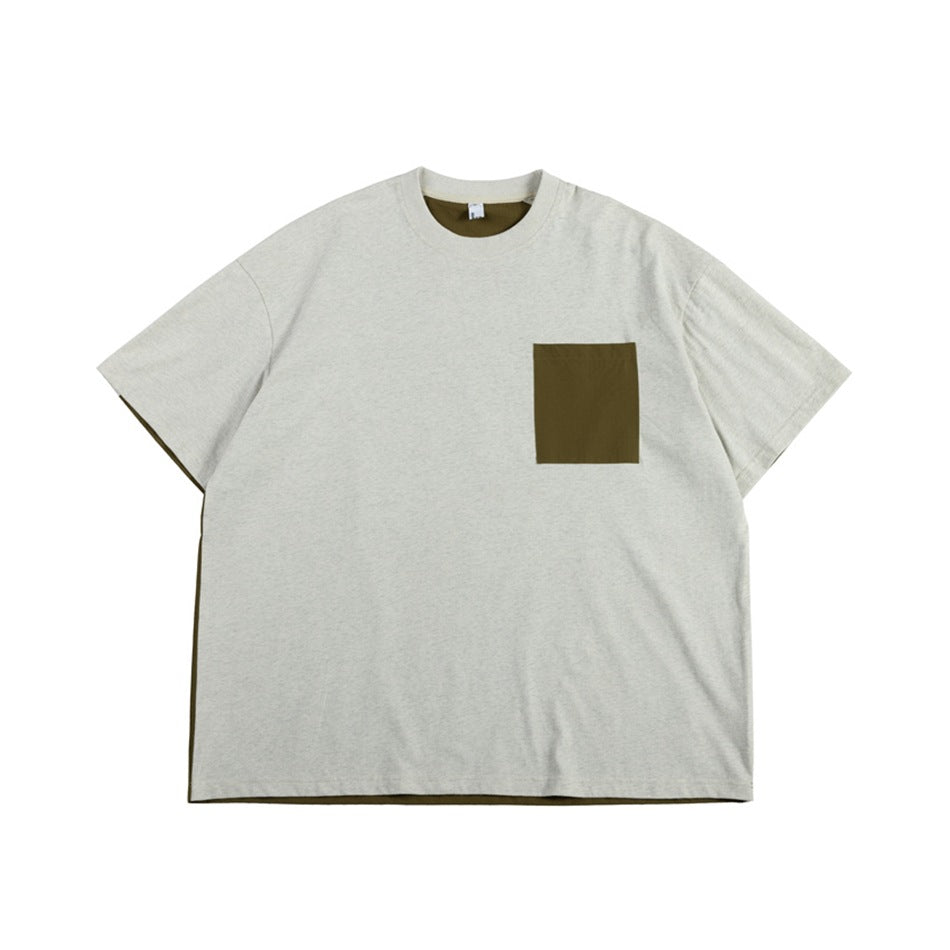 Heathered light gray short-sleeve T-shirt with an olive brown chest pocket and olive hem showing beneath, flat lay