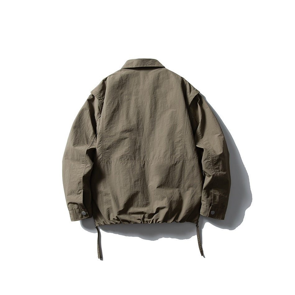 Back view of an olive-gray jacket with a collar, snap cuffs, and dangling hem drawcords.