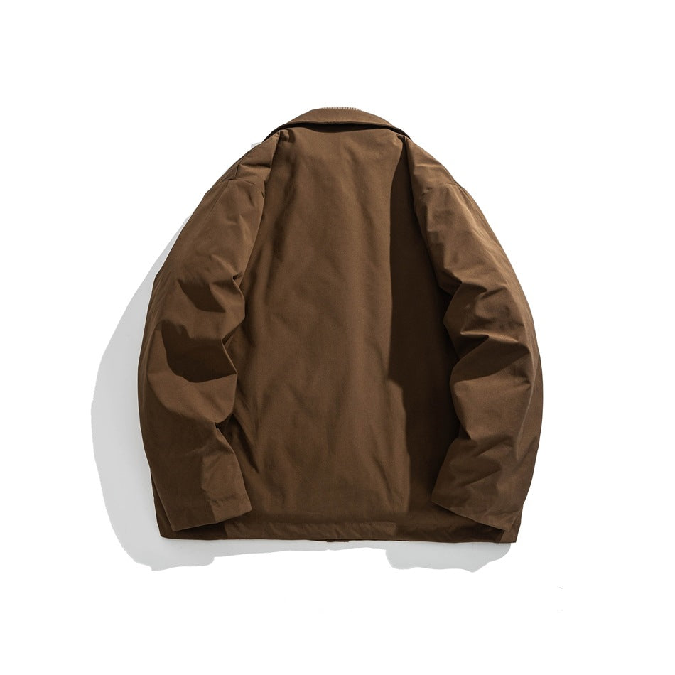 Back view of a brown jacket laid flat against a white background.