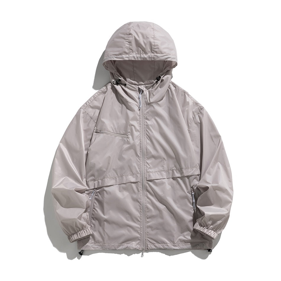 Light gray hooded zip-front jacket flat lay with chest zip pocket, front zip pockets, elastic cuffs and drawcord hem