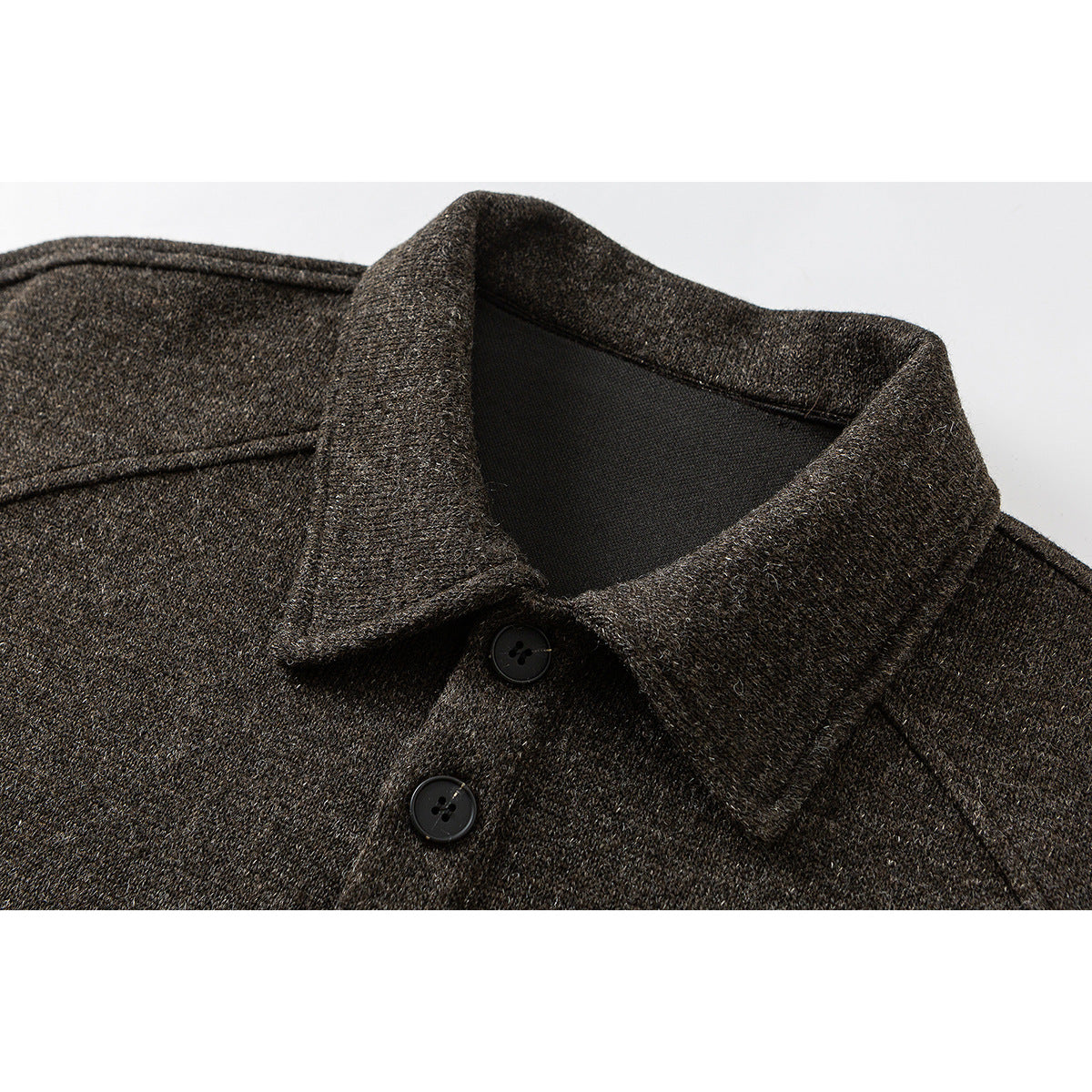 Close-up of a dark brown heathered collared pullover with a two-button placket.