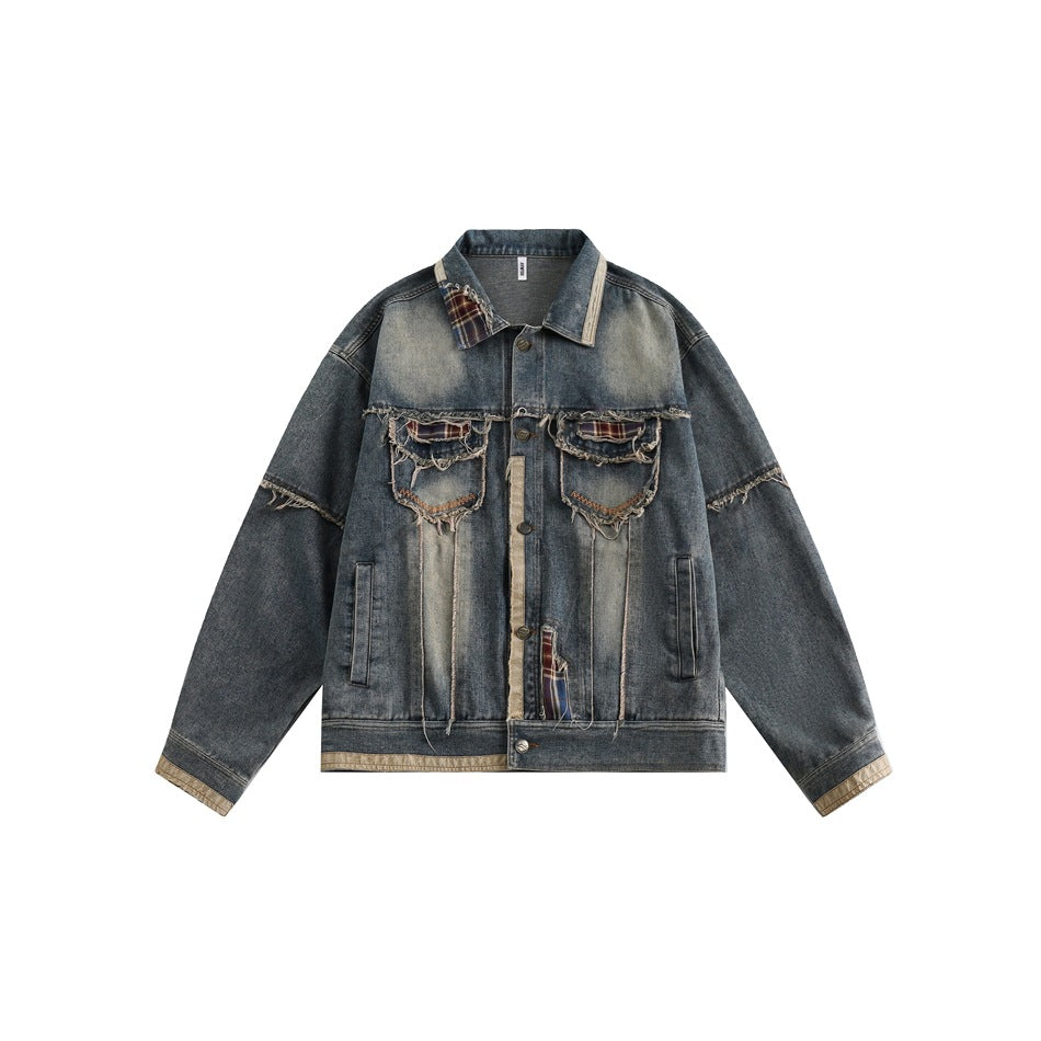 Front view of washed blue denim jacket with frayed plaid-accent chest pockets and beige trim