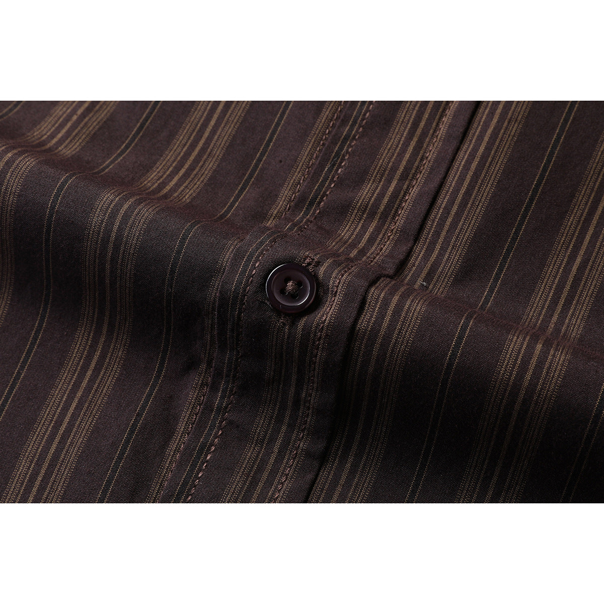 Close-up of a dark brown striped shirt showing a dark button and stitched button placket.