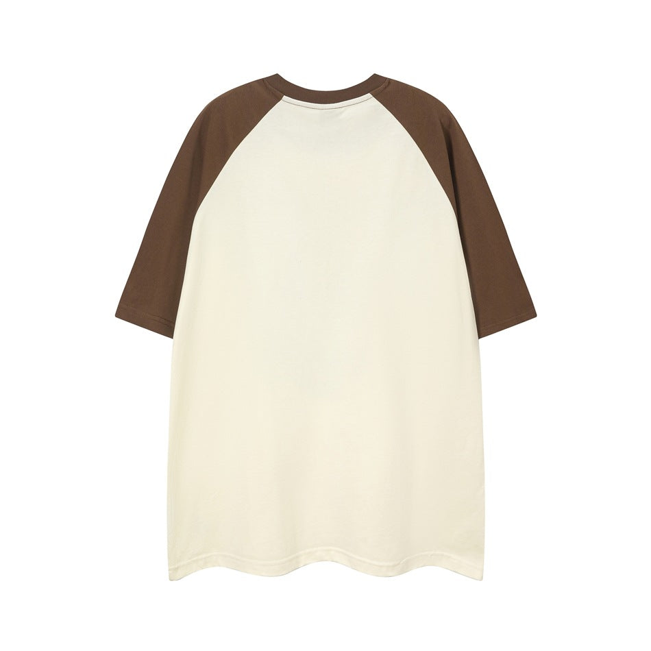 Back view of an apricot raglan T-shirt with brown sleeves and neckband and a plain back