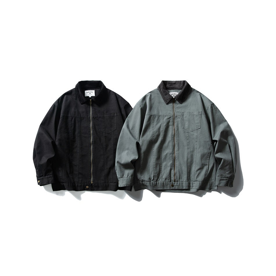 Two zip-front jackets displayed side by side in black and muted gray-green, each with a collar and chest pocket.