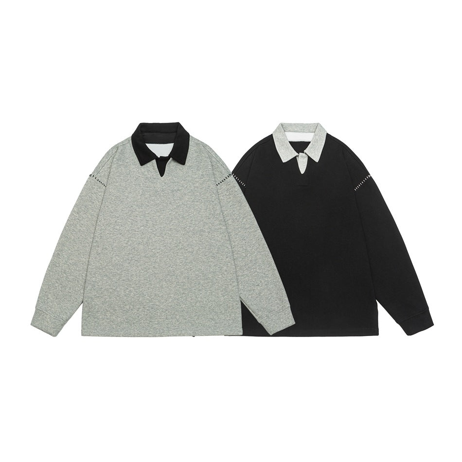 Two long-sleeve collared tops shown together: light gray with a black collar and black with a light gray collar.