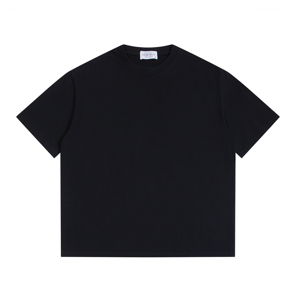 Black short-sleeve crew neck T-shirt laid flat, front view, with a small neck label