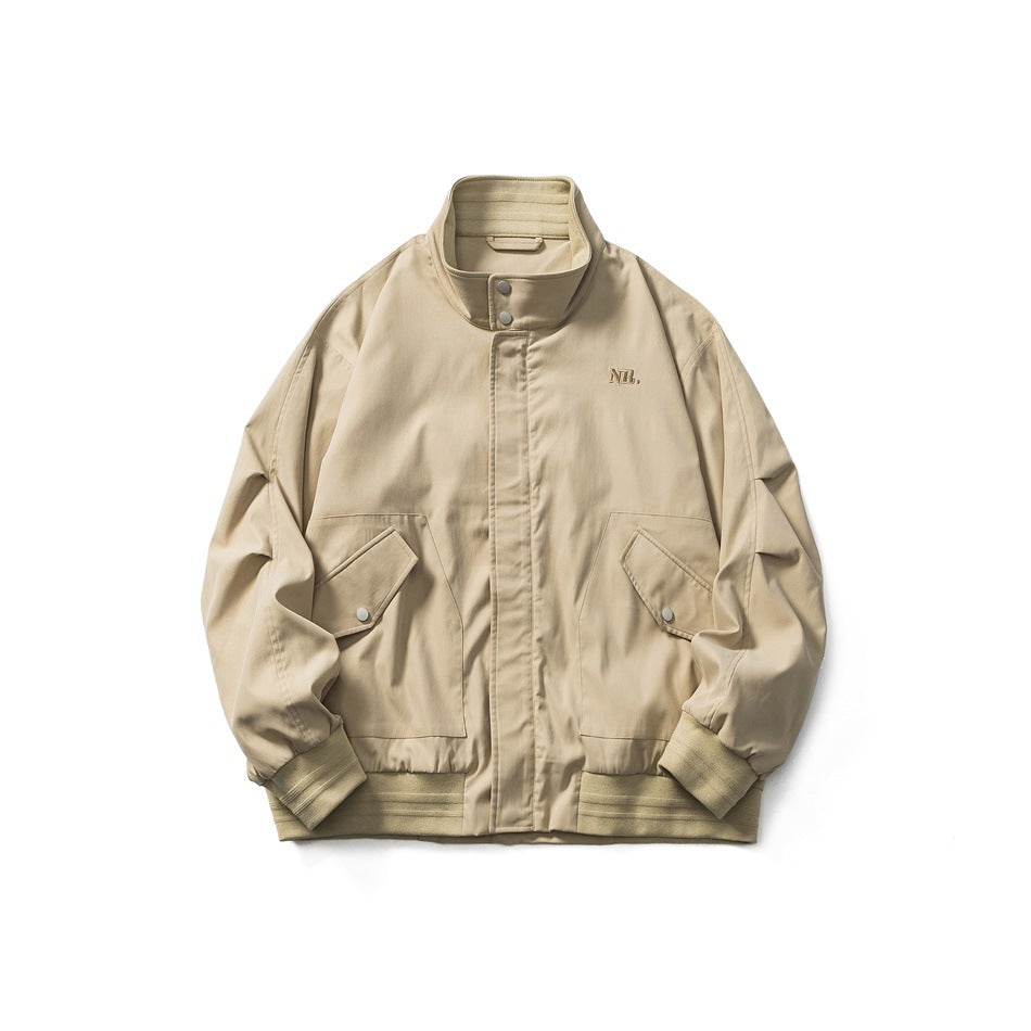 Light khaki stand-collar jacket flat lay, front view, with zip placket, flap pockets and ribbed cuffs and hem
