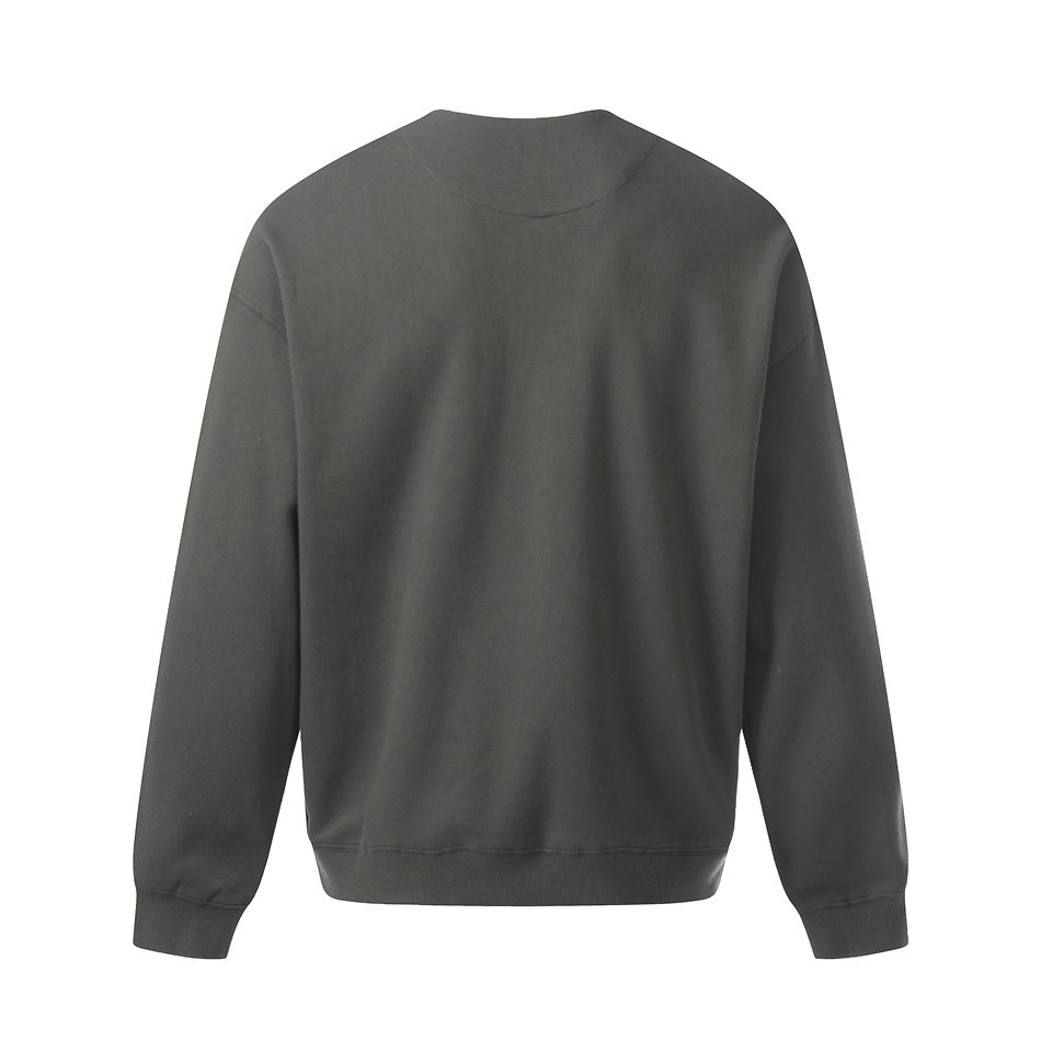 Back view of a charcoal gray long-sleeve top with a round neckline and ribbed cuffs and hem.