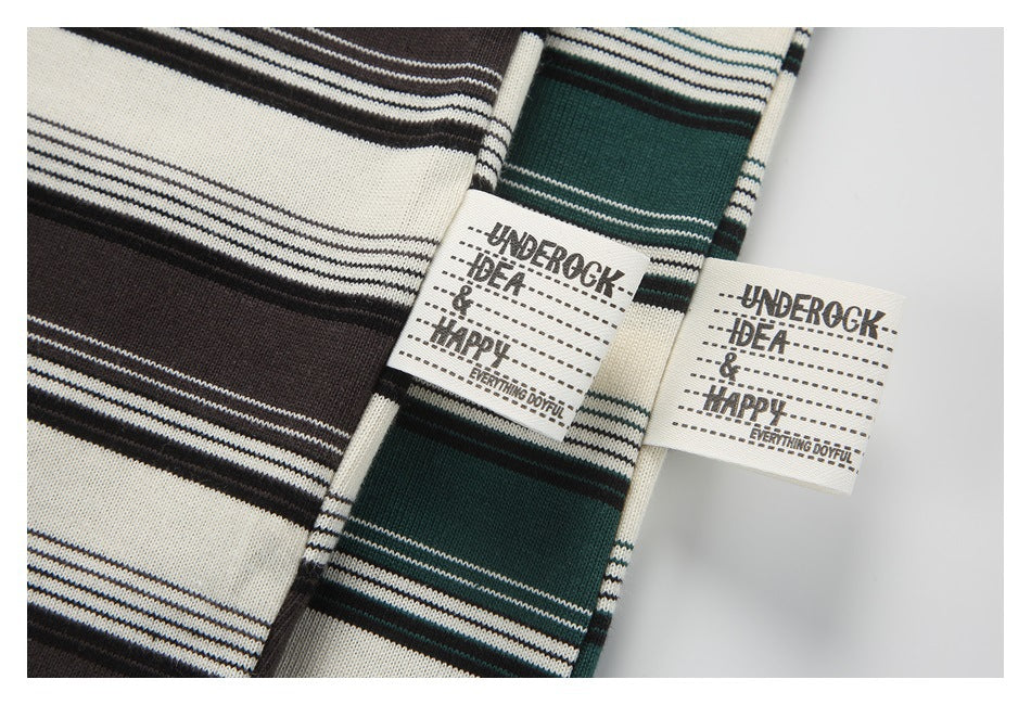 Green and dark brown striped knit colorways with small woven slogan labels.