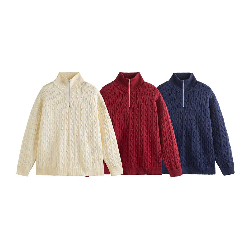 Three cable-knit quarter-zip sweaters shown together in ivory, burgundy, and navy.