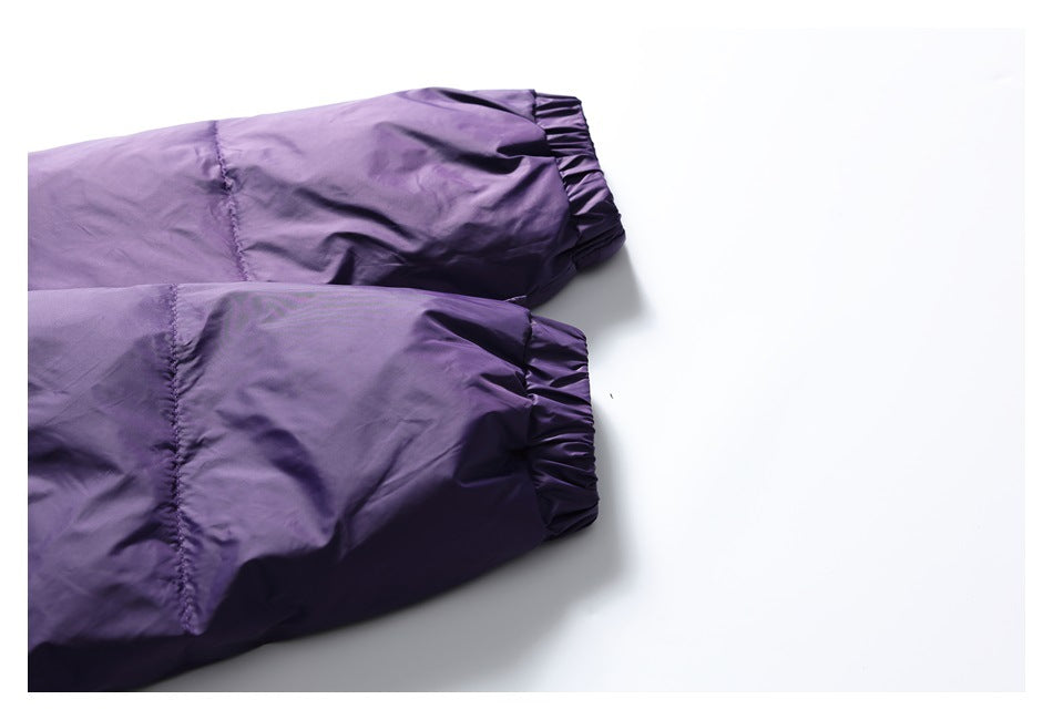 Close-up of two purple jacket sleeves with gathered elastic cuffs.