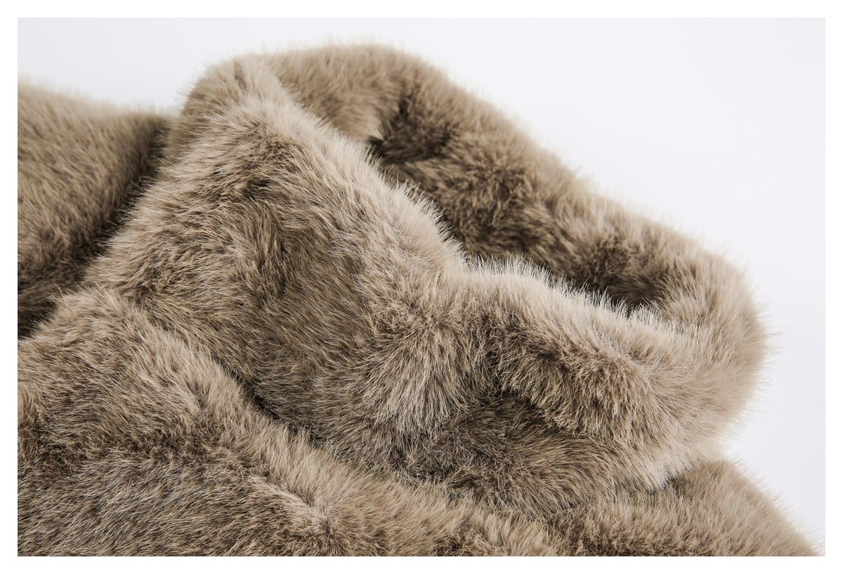 Close-up of the coat's wide, plush brown faux-fur collar folded over the front.