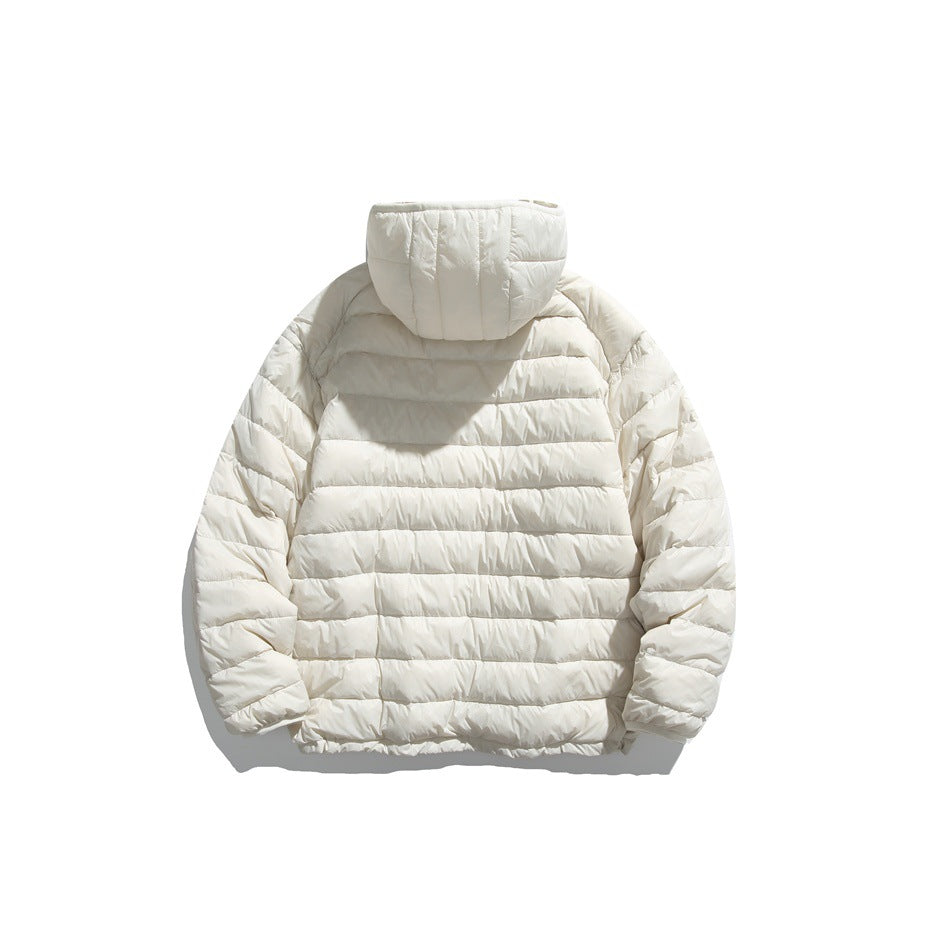 Back view of an ivory hooded puffer jacket with horizontal quilting.