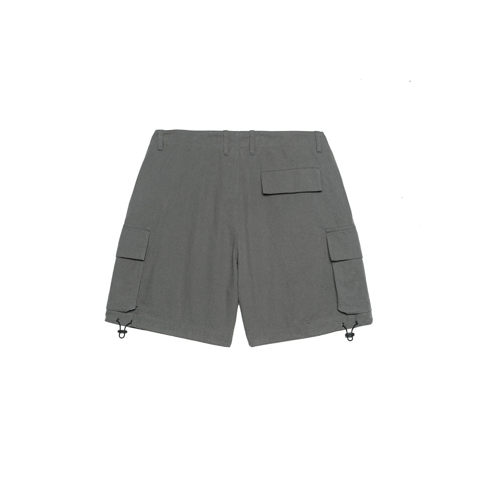 Front flat lay of gray cargo shorts with multiple flap pockets, belt loops and adjustable hem cords.