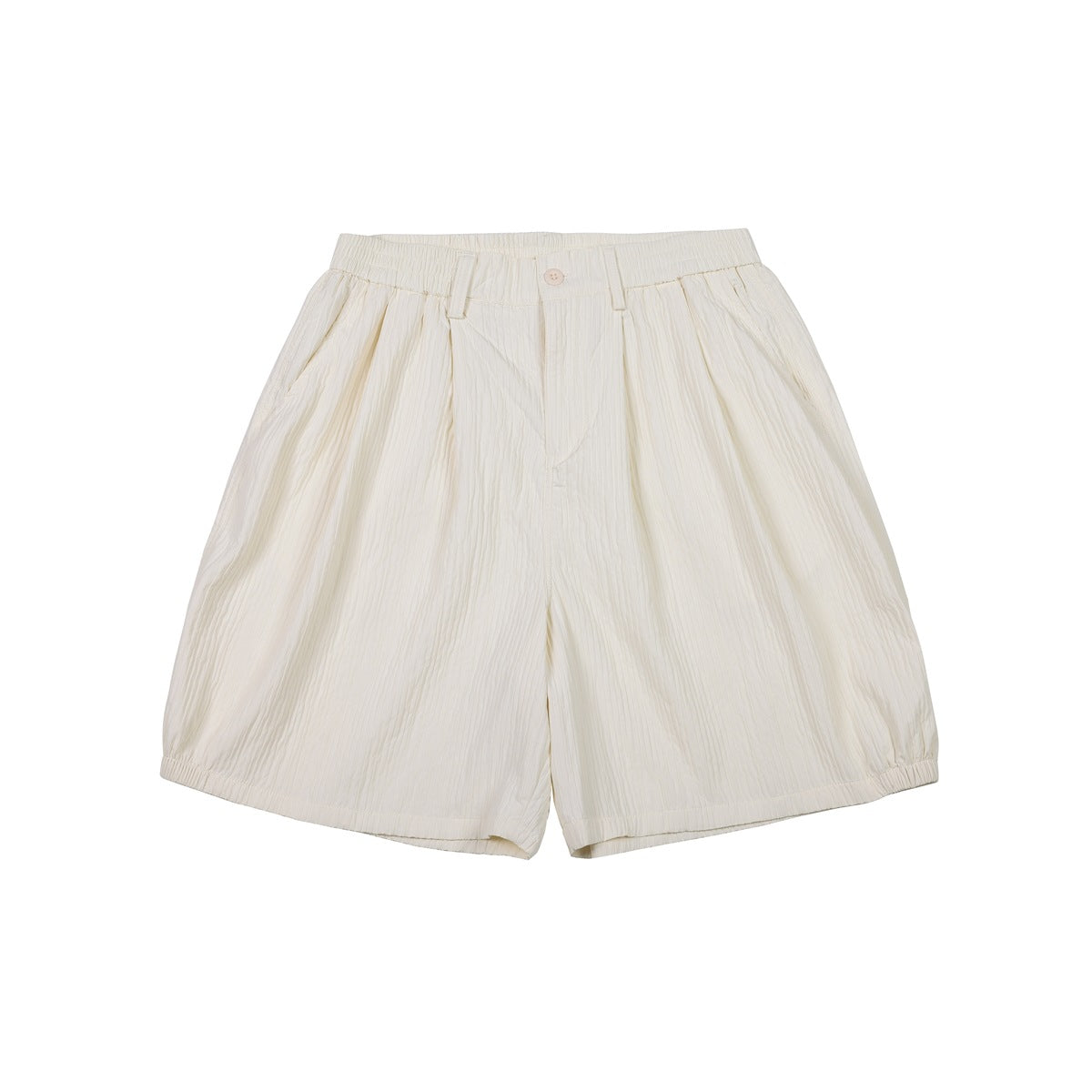 Front view of cream beige pleated knee-length shorts with elastic waistband, button closure and gathered hems