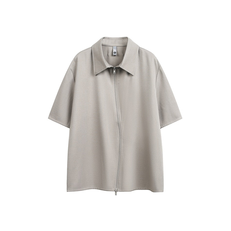Gray taupe short-sleeve shirt with pointed collar and matching curved front zipper, flat view