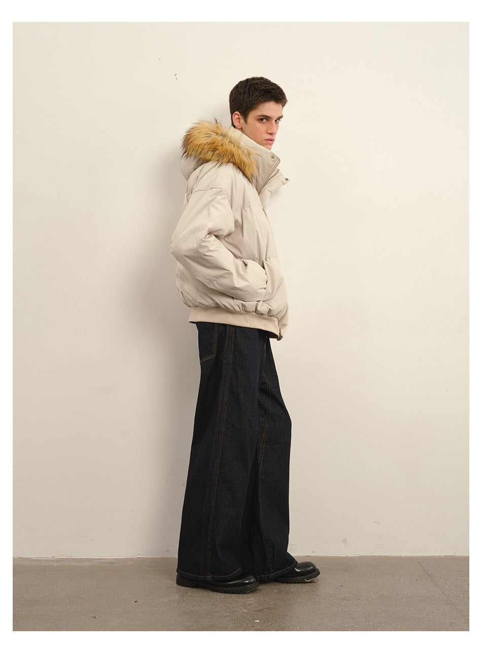 Model wearing a light beige puffer jacket with a tan fur-trimmed hood, shown from the side.