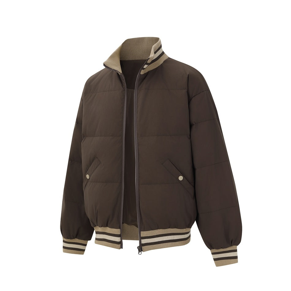 Angled front view of a brown quilted zip jacket with a striped ribbed collar, cuffs, and hem, plus two snap-tab pockets.
