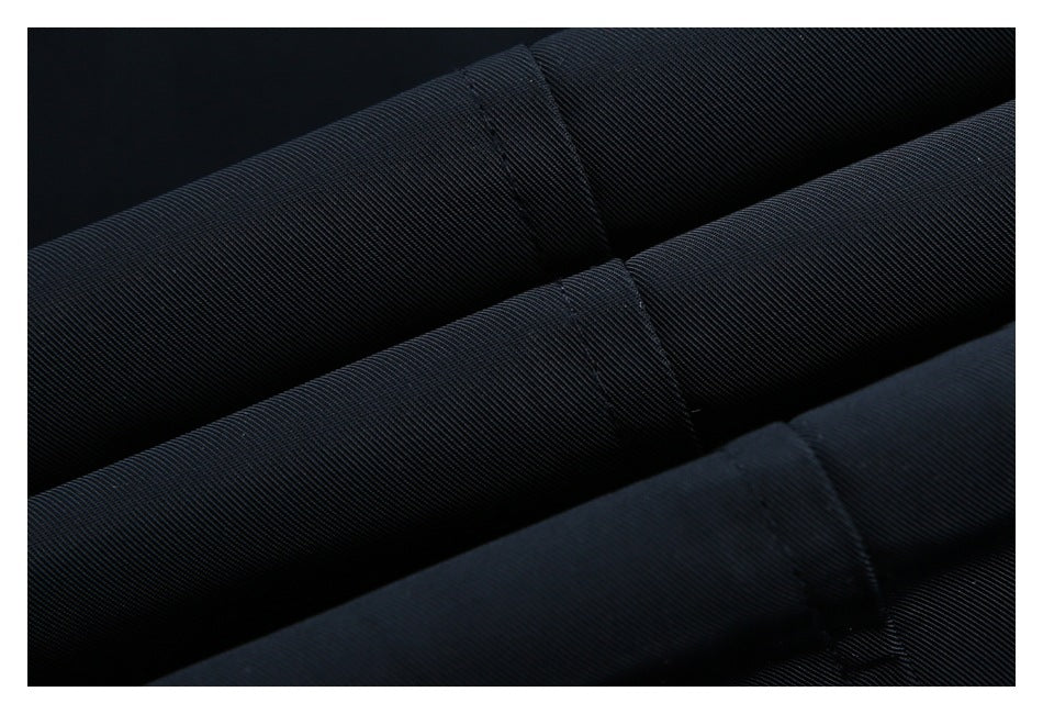Close-up showing the fine diagonal weave and stitched bands of dark navy fabric.