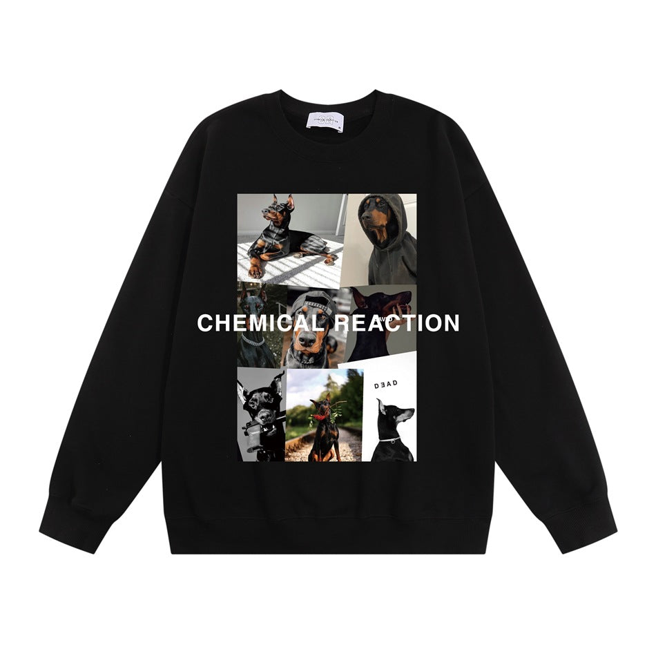 Black crewneck sweatshirt with Doberman photo collage and white CHEMICAL REACTION text, flat lay front view