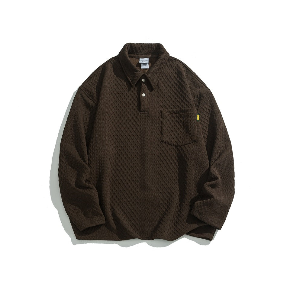 Brown long-sleeve textured polo pullover with collar, two buttons and chest pocket, flat lay front view